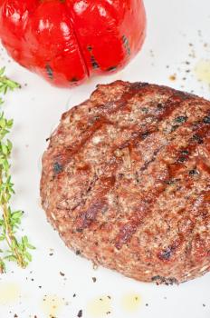 grilled beef steak with herbs and pepper