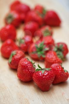 Fresh strawberries  at wooden background