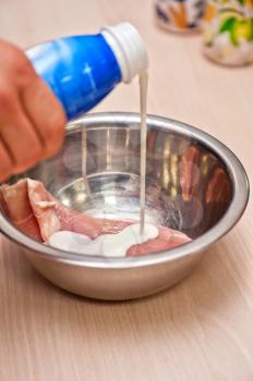 cooking chicken breast meat with yogurt sauce