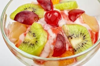 Fruit salad with ice cream in plate 