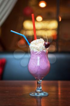 Cherry milkshake with fresh fruits