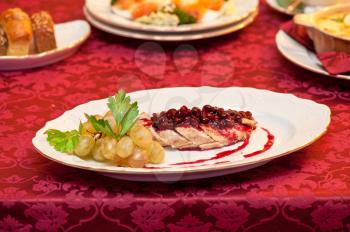 chicken breast meat with cranberry sauce