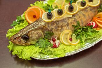 zander fish baked with greens fruits and vegetables