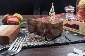 Table with cakes ans coffee cup