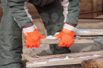 Carpenter working at sawmill, closeup photo