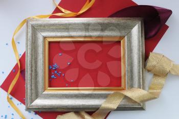 Decorated frame with red paper background