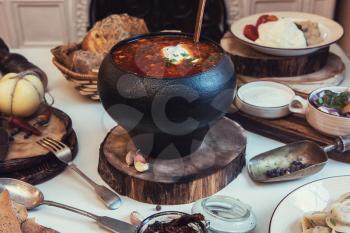Russian food: borsch pickles cheese meat dumplings and fat