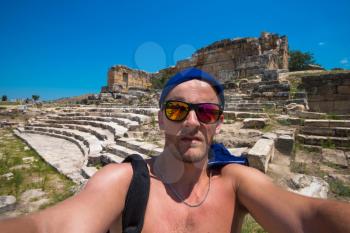 Portrait of man in ancient theatre in the city Hierapolis, near modern turkey city Denizli