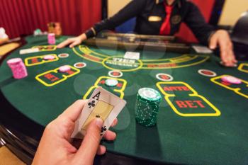 Casino, gambling and entertainment concept - poker game, point of view