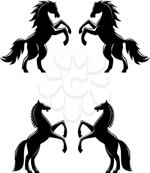 Two rearing up horses silhouettes in black for heraldry design