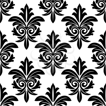 Bold foliate arabesque motif in black and white in a repeat seamless pattern suitable for damask style wallpaper and textile design