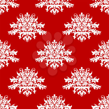 Red or amaranth colored seamless damask style fabric pattern with an ornate floral arabesque motif in square format