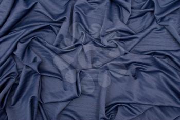 Blue satin textile background 