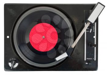 Old turntable with vinyl record