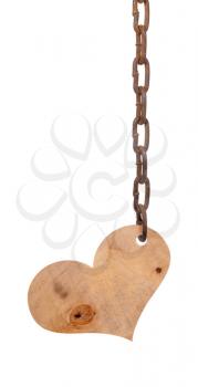 Wooden heart on the iron chain