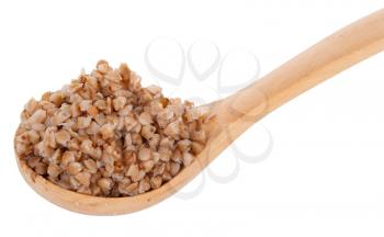 Wooden spoon with porridge buckwheat