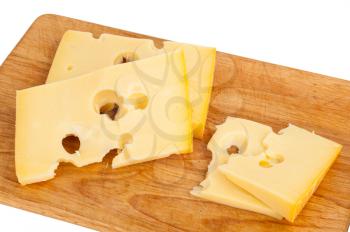 Cheese on kitchen plank