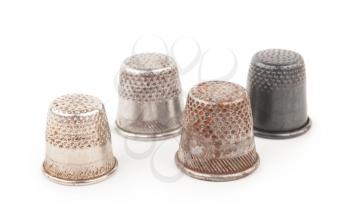 Thimbles on a white background