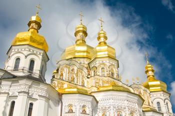 Kiev-Pecherskaya Laura. Cloudy sky and Cupola of Orthodox church