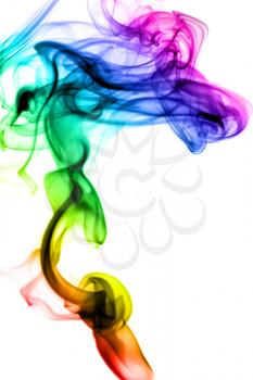 Magic colorful fume swirl over the white background