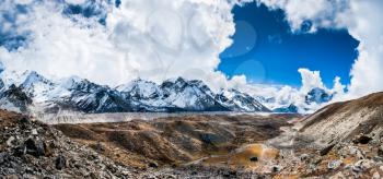 Panoramic view on the mountain peaks and glacier near Everest base camp. Trekking in Himalaya