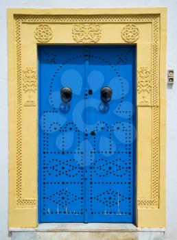 Blue door with ornament from Sidi Bou Said in Tunisia. Large resolution