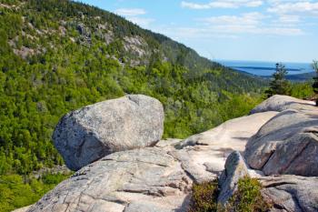 View of giant boulder in Acadia National Park, Atlantic Coast of Maine.