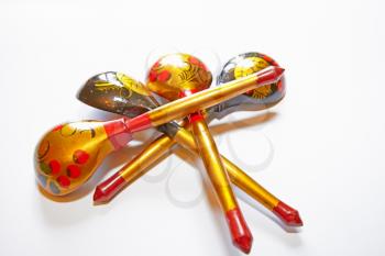 Traditional Russian folk craft. Hand painted spoons and ladels on white background.