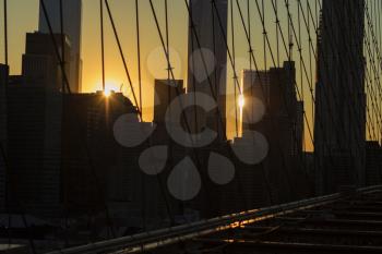 Bright lights of New York City at sunset.