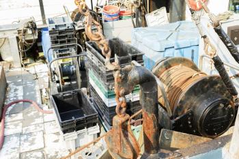 Detail of commercial fishing boat equipment at the dock.