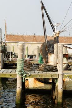 Detail of commercial fishing boat equipment at the dock.