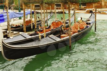 Venice, Italy-April 1, 2013: Street views of canals and ancient architecture of Venice, Italy.