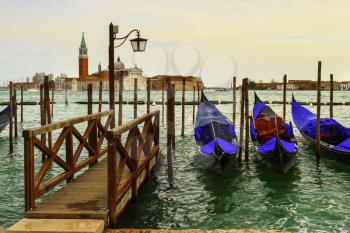 Venice, Italy-April 1, 2013: Street views of canals and ancient architecture of Venice, Italy.