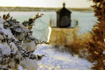 Winter scene with a Lighthouse.