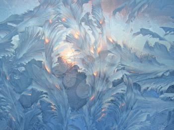 natural frost and sun on winter windowpane