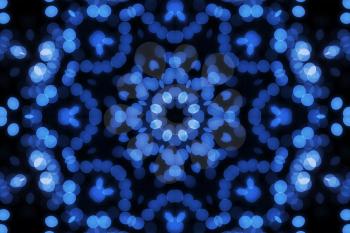 Dark background with unfocused blue bulbs pattern