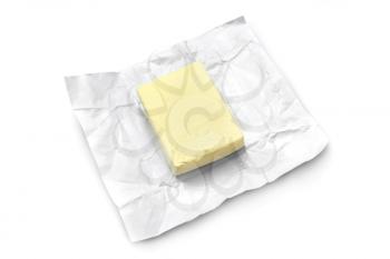 Piece of butter isolated on a white background