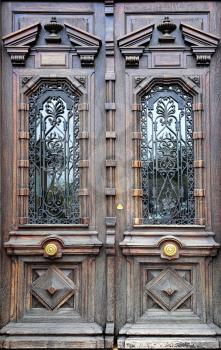 Old artistic wooden door with decorative elements, Cannes, French Riviera