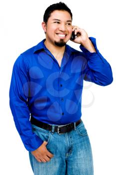 Royalty Free Photo of a Latin American Young Man Talking on His Cell Phone