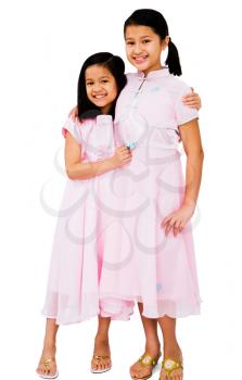 Royalty Free Photo of a Two Young Girls Embracing Each Other