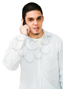 Royalty Free Photo of a Young Male Model Talking on a Cellular Phone