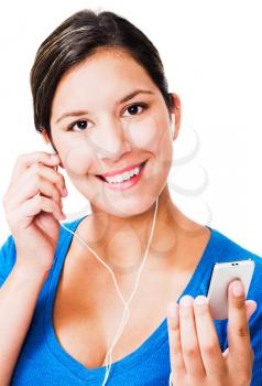 Royalty Free Photo of a Woman Listening to an iPod