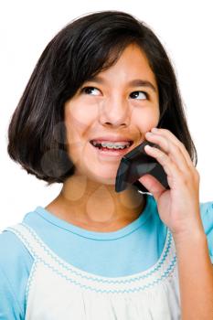 Royalty Free Photo of a Young Girl Talking on a Cell Phone