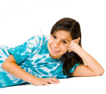 Royalty Free Photo of a Young Girl Laying on the Floor Posing for the Camera