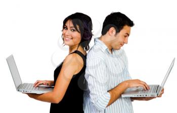 Latin American couple using laptops and smiling isolated over white