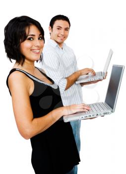 Royalty Free Photo of a Man and a Woman Holding Laptops