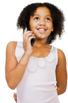 Royalty Free Photo of a Young Girl Talking on a Cellular Phone