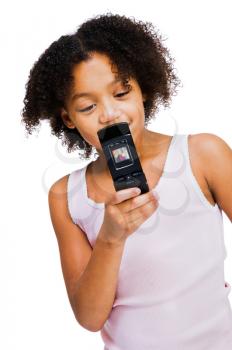 Royalty Free Photo of a young Girl Texting