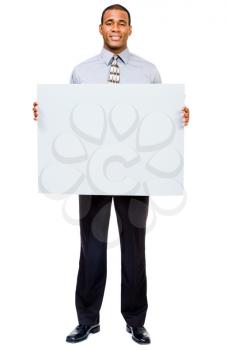 Royalty Free Photo of a Businessman Holding Blank Placard