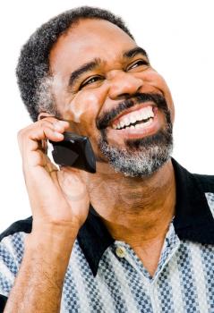 Royalty Free Photo of a Happy man Talking on his Cell Phone